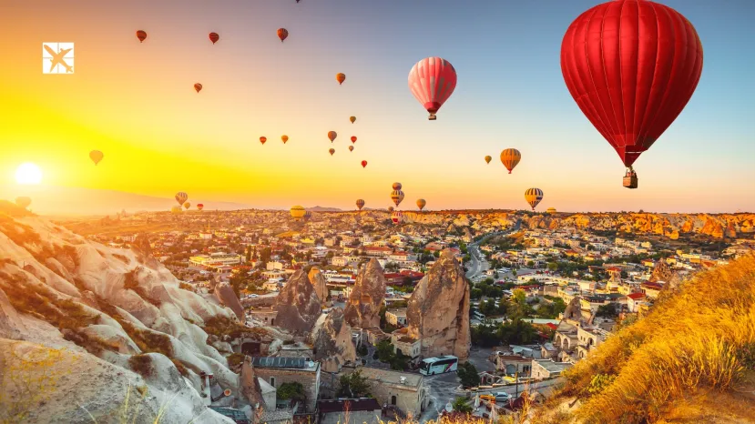 Hot Air Balloons flying over a spectacular view of Cappadocia