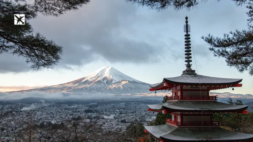 snow capped mountain with temple