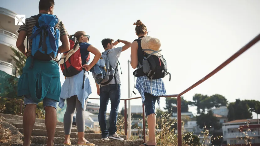 four people backpacking